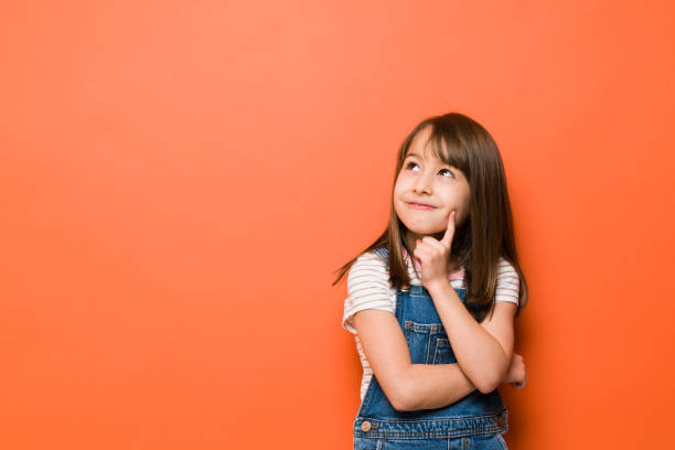 Cute little girl having some good ideas