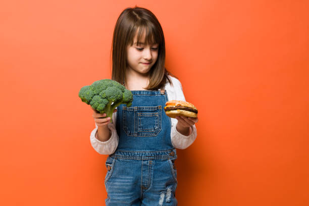 istock Girl trying to make the right choice 1386514910