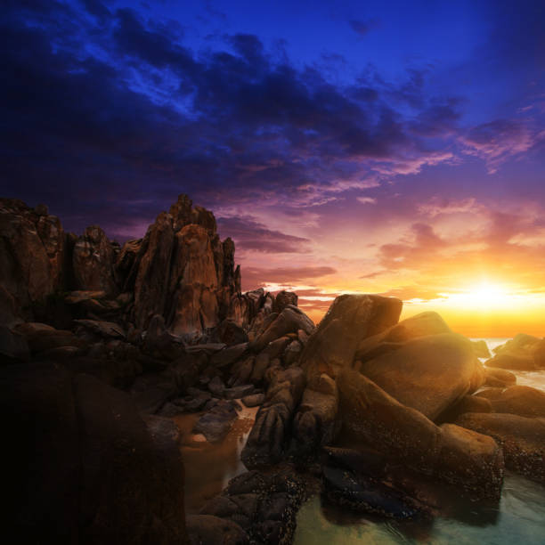 istock Dramatic sunset over the lighthouse on an island at Ke Ga coast 1386523100