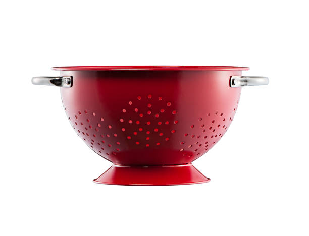 Stainless steel red colander isolated on white background
