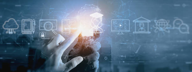 istock Hand working with computer touch screen with Distance and online learning concept  on green background. 1386523589