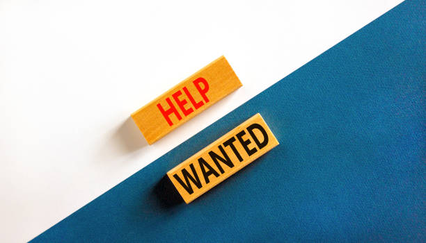 istock Help wanted and support symbol. Concept words Help wanted on wooden blocks on a beautiful blue table white background. Business support and help wanted concept, copy space. 1386532040