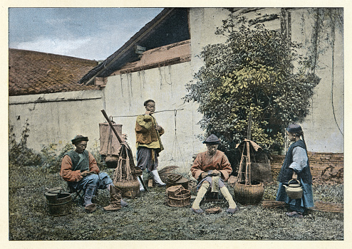 Vintage colourised illustration after a photograph of Group of Chinese itinerant shoemakers, China, Victorian 19th Century