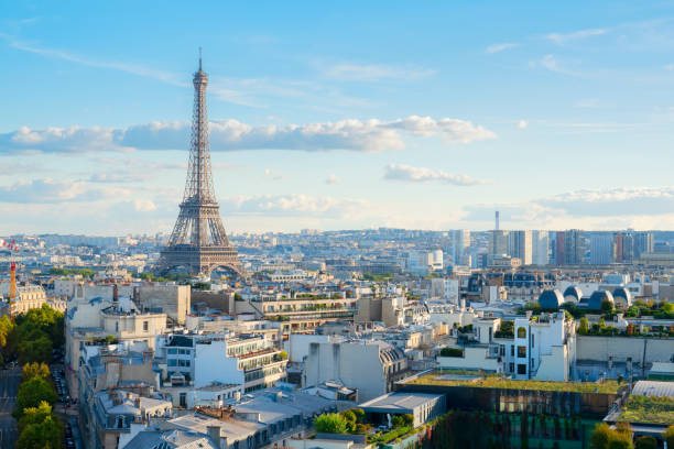 istock eiffel tour and Paris cityscape 1386540142