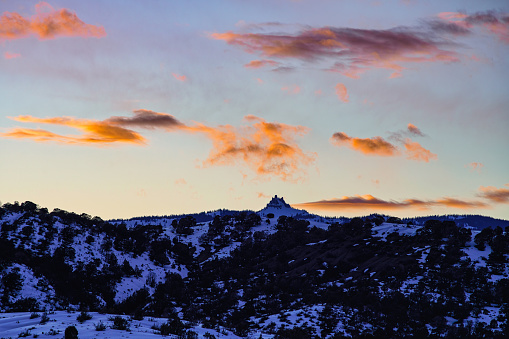 Castle Peak Sunset - Silhouetted castle-looking mountain near Eagle and Wolcott, Colorado USA.