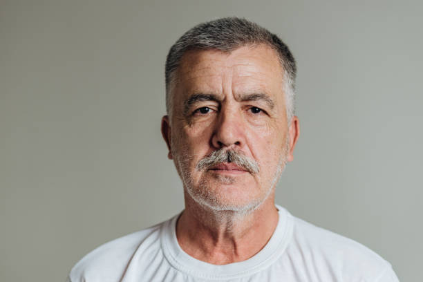 istock Portrait of a mature man looking at camera 1386544601