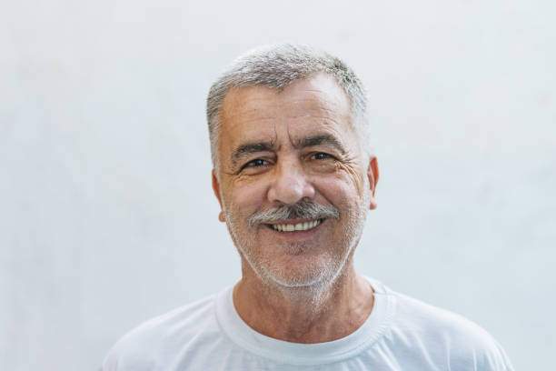 istock Portrait of a smiling senior man 1386544607
