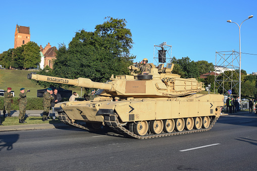 Warsaw, Poland - 12 August, 2018: American Abrams tank driving on a parade before the Polish Armed Forces Day. The M1A2 Abrams is a third-generation American main battle tank designed by Chrysler Defense.