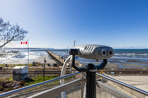 Lookout binoculars at White Rock pier BC Canada