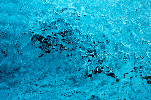 Iceberg Texture Detail of Old Light Blue Ice. Jökulsarlon Black Beach Iceberg Detail, Southern Iceland, Iceland.