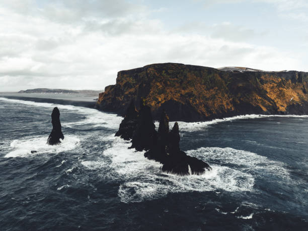 istock Iceland Reynisdrangar Sea Stacks Black Beach Vik i Myrdal Cliff 1386551027