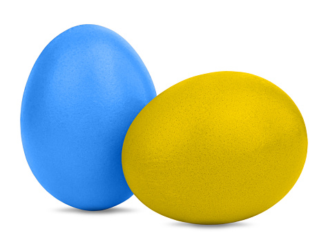 Two Easter egg in blue and yellow color, the colors of the flag of Ukraine. Isolated on white background.