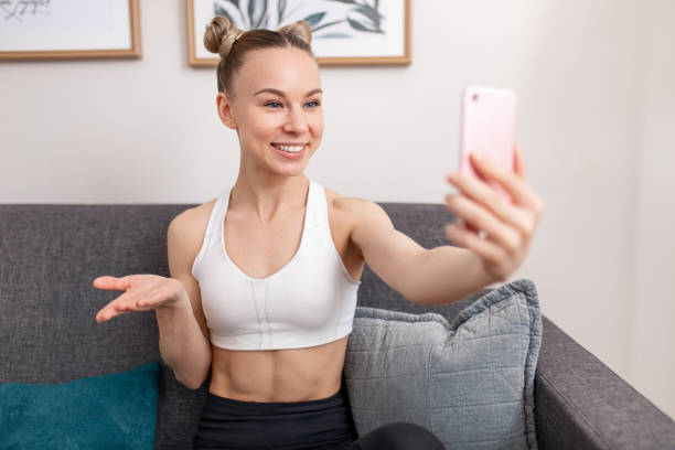 istock Fit influencer recording video for blog 1386577901