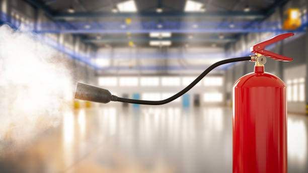 istock Fire extinguisher in factory 1386578003