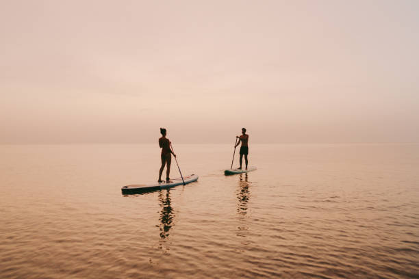 istock Paddling the ocean together 1386580573