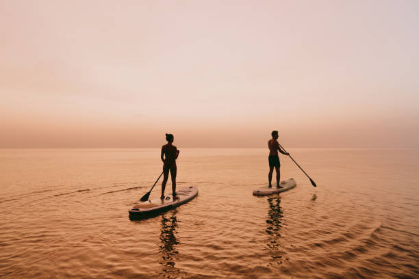 istock Paddling the ocean together 1386580599