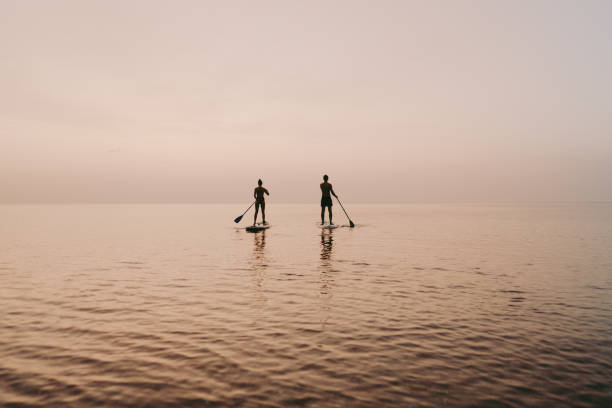 istock Paddling the ocean together 1386580600