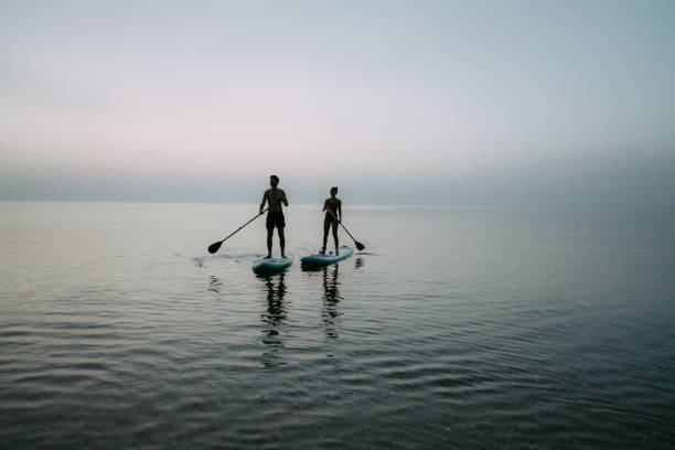 istock Paddling the ocean together 1386580603