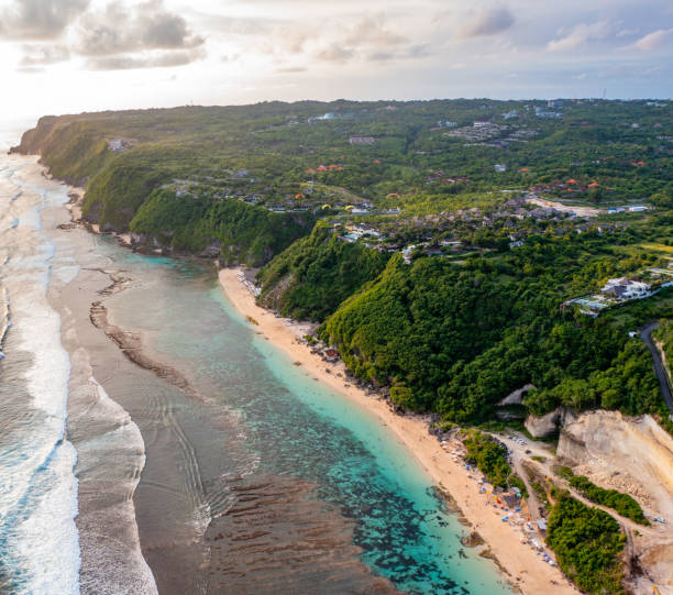 Sunset over island. Uluwatu, Bali.