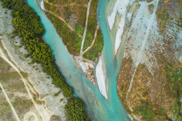 istock Flowing of small river, aerial view. 1386591910