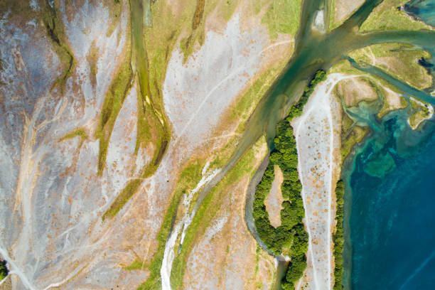 istock Looking straight down on riverbank, idyllic. 1386591992