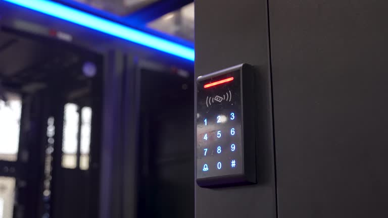 Woman push down electronic control machine with finger scan to access the door of or data center. The concept of data security or data access control.