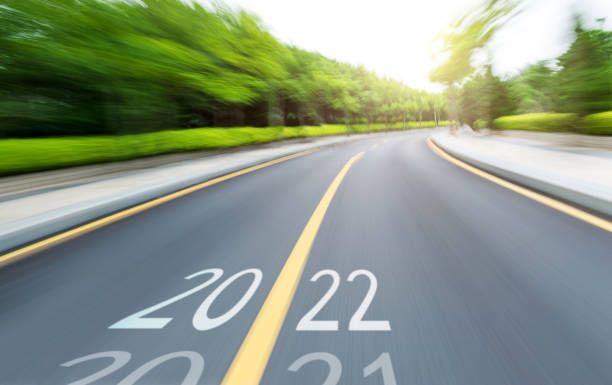 istock Blurred road with number 2021 change 2022 1386596170