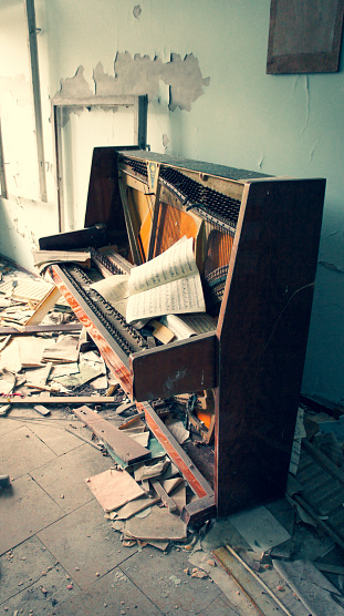 Broken piano falling apart as it ages when left behind when the town was deserted on 27 April 1986.
Abandoned everyday life in Pripyat, Ukraine
