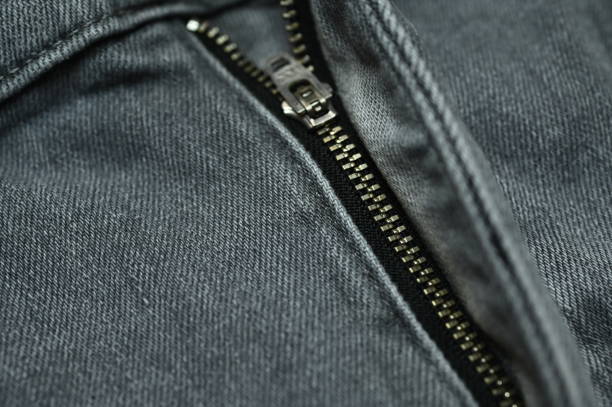istock metallic zip on denim jeans 1386612239