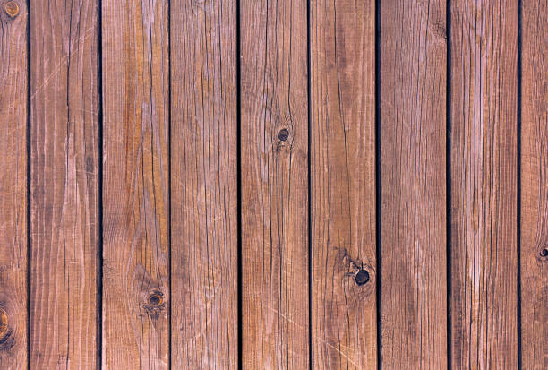 istock Grunge old  wood door textured background 1386613822