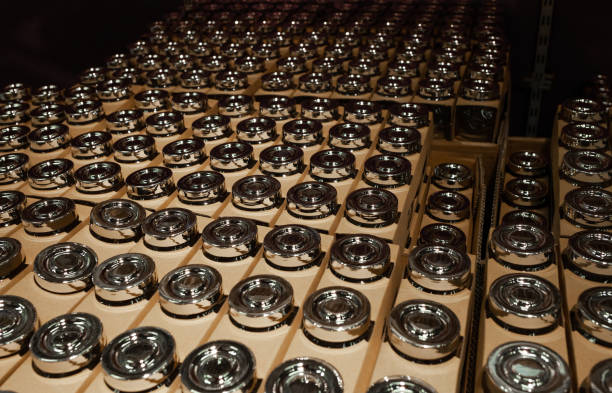 Bottle cap background, glass bottle in cardboard box