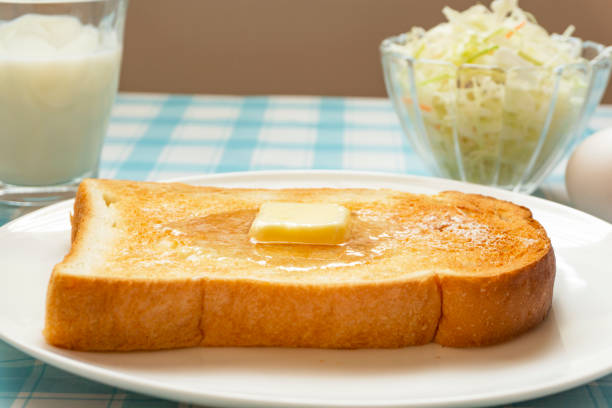 Breakfast bread. Toast and melting butter.