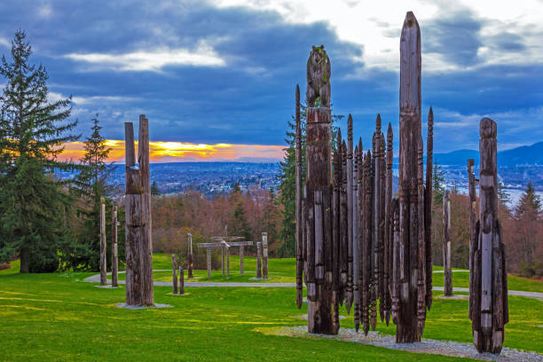 Totem poles in Burnaby Mountain Park stock photo