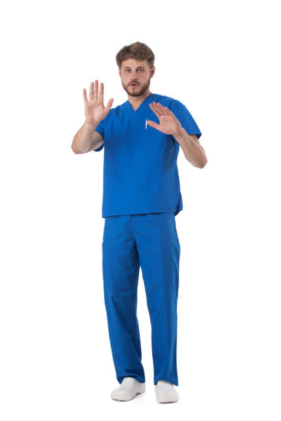 istock Male nurse showing stop sign 1386624293