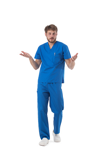 Male nurse with clueless and confused expression isolated on white background