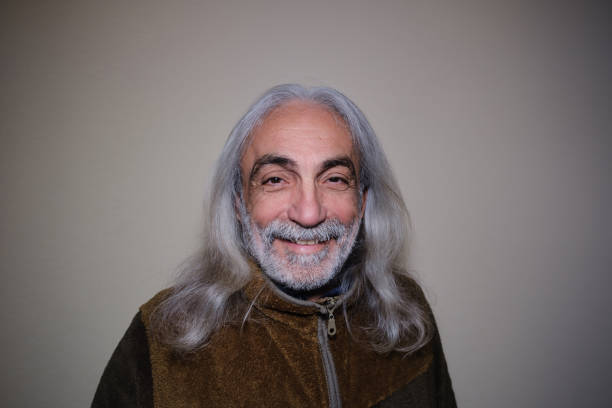 istock Elderly man looking at camera with high vigor to live hopeful 1386624467