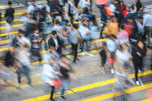 istock Blurred Businesspeople On Their Way To Work 1386631526