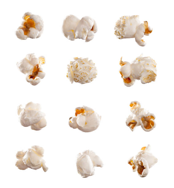 shot of a group of popped popcorn kernels against a studio background - popcorn bildbanksfoton och bilder