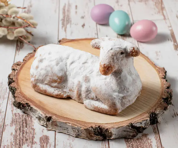 Easter sweet lamb cake, eggs willow on a wood  background, stock photo