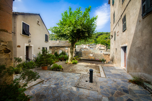 The small square Piazza Paulaccia in the beautiful village of Vescovato, Corsica