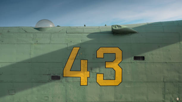 istock Number 43 written on metal surface with rivets. 1386637173