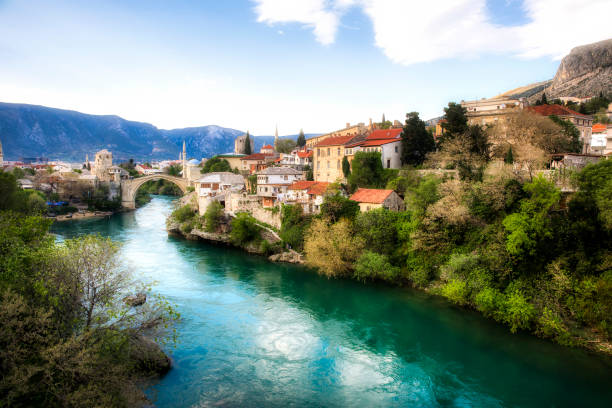 The Famous Old Bridge (Stari Most) Crossing the River Neretva in Mostar, Bosnia and Herzegovina The famous Old Bridge (Stari Most) crossing the River Neretva in Mostar, Bosnia and Herzegovina stari most mostar stock pictures, royalty-free photos & images