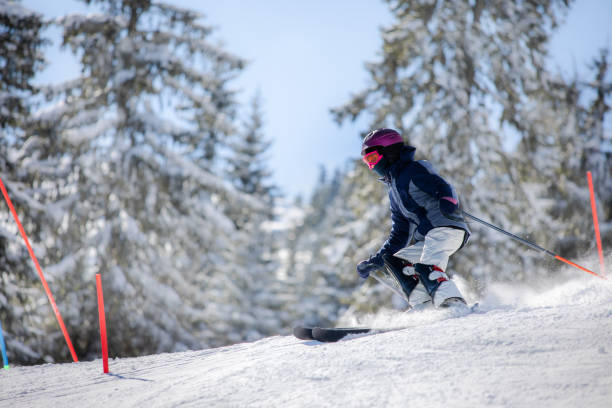 istock Little girl skiing 1386645831