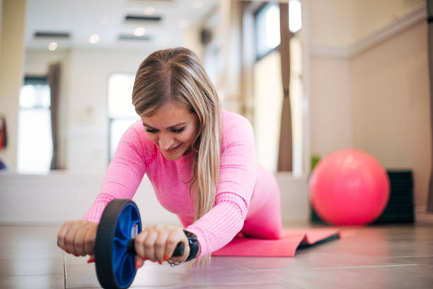 istock Young And Beautiful Woman Exercises 1386651578