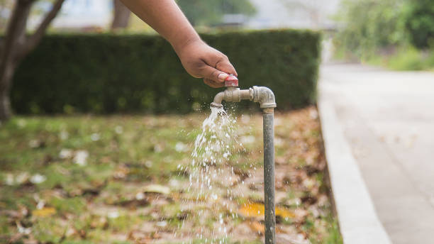 istock Turn off the water tap in the lawn. 1386665718
