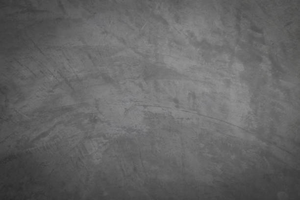 istock Old gray cement wall with cracks on the surface. 1386665757