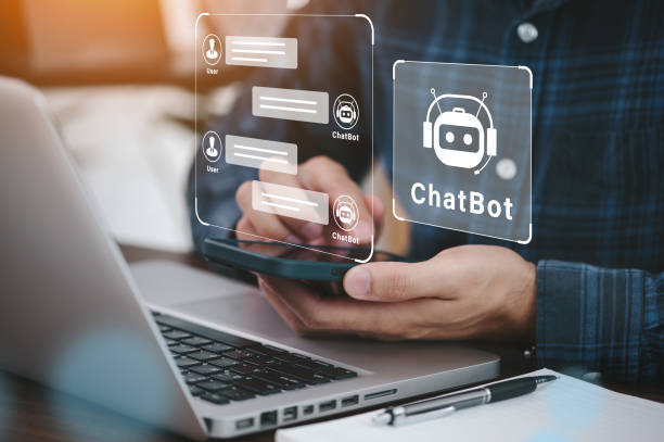 Using system AI Chatbot in computer or mobile application to uses artificial intelligence chatbots automatically respond online messages intelligent service to help customers stock photo