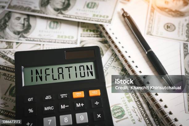 Inflation Word On Calculator In Idea For Fed Consider Interest Rate Hike World Economics And Inflation Control Us Dollar Inflation Stock Photo - Download Image Now