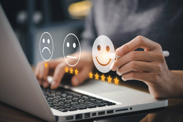 User give rating to service experience on online application for Customer review satisfaction feedback survey concept.