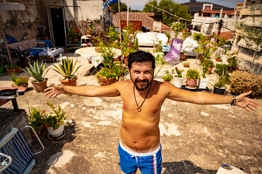 Brazilian Latino traveler is happy and full of life.